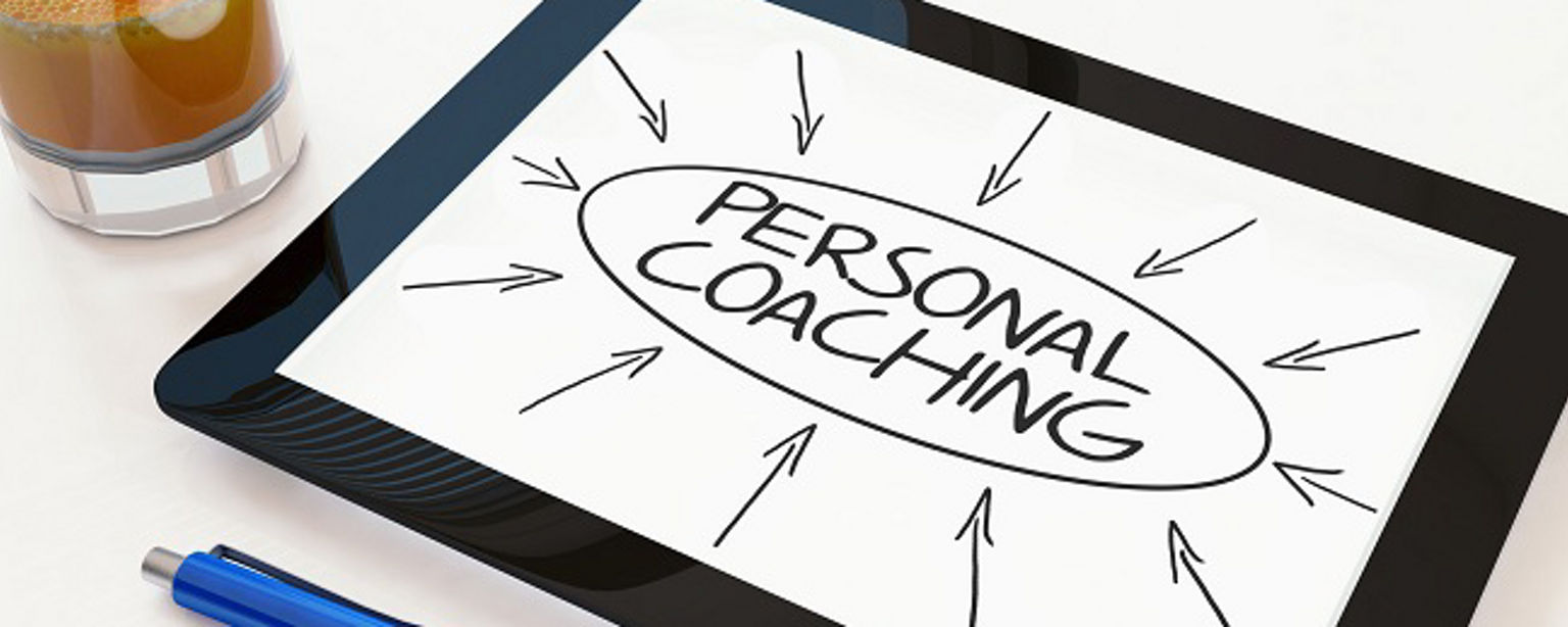Personal Coaching - text concept on a mobile tablet computer on a desk - 3d render illustration.